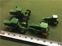 assortment of mini John Deere tractors