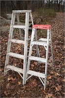 2 aluminum step ladders: 4' Werner, 5'; as is