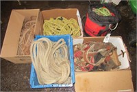 Various climbing harnesses and rope.