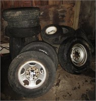 Assortment of tires. Note some have rims.