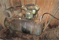 Horizontal air compressor. Note unknown working