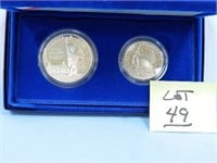 1986s U.S. Liberty Silver Dollar & Clad Half -