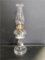 clear glass oil lamp