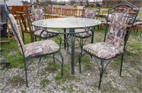 Glass top dining table with chairs