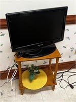 22” Samsung tv & stand, remote faux flower