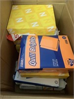 box of printer paper 12 reams mostly yellow and