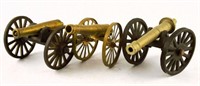 Lot #3152 - (3) brass and cast iron toy cannons