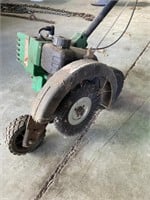 Weed Eater brand edger w/ brush wheel attached