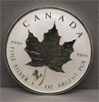 2014 1 Oz. Silver Canadian Maple Leaf.
