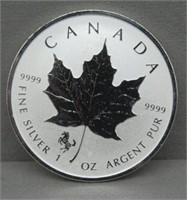 2014 1 Oz. Silver Canadian Maple Leaf.