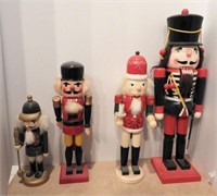 Lot #3645 - (4) hand crafted wooden nutcrackers