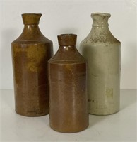 Three English Stoneware Gin Bottles