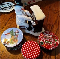 Untested snowman playing piano and tins