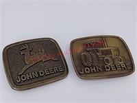 (2) 1977 belt buckles 4840 tractor, two leg logo