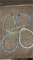 Four  woven sports necklaces
