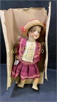Antique bisque head, wood body doll made Germany