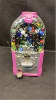 Gum ball machine full of vintage marbles