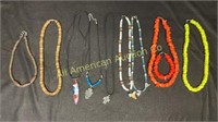 Nine "Surfer" necklaces, various