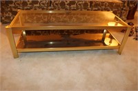 Brass Colored Glass Top Coffee Table 51.25" X
