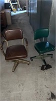Two metal office chairs