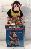 Battery operated musical jolly chimp