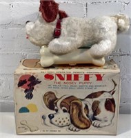 Vintage Japan battery op sniffy the nosey puppy