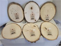 Group of unopened wood slabs tallest 9.5"L