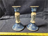 Pair of decorated candle holders