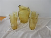 Group of 7-amber/yellow pitcher 9" H  with 6