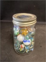 Small Mason Jar Full of Marbles