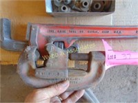 Pipe cutter and pipe wrench