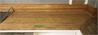 Section of butcher block countertop. Worn but can