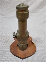 Brass 1 1/2" Waterfoc Nozzle on Wood Stand