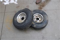 (2) Carlisle trailer tires on rims