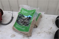 2 - 7 lb. bags of lawn grass seed