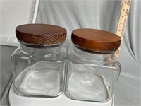 lot of 2 glass jars with wooden lids