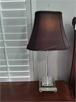 Glass lamp with Brown shade.