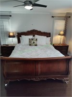 King size sleigh type bed.