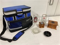 Cooler bag with beer mugs. Lighter. Ashtrays.