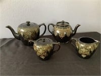 Antique creamer and sugar set with tea pots