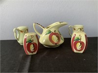 Vintage salt and pepper shakers with pitcher