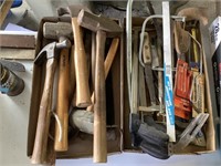 Assorted hammers and saws