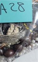 K - BAG OF COSTUME JEWELRY (A28)