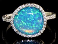 Stunning Blue Opal & White Topaz Halo Ring