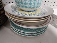 Stack of teal plates and more