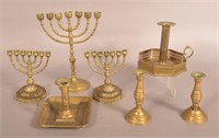 Seven Antique Brass Menorah and Candlesticks.