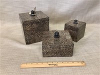 3 spotted boxes