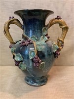 Vase with grapes