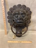 Large bronze lion head door knocker