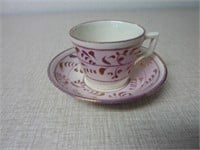 ANTIQUE LUSTER WARE CUP AND SAUCER